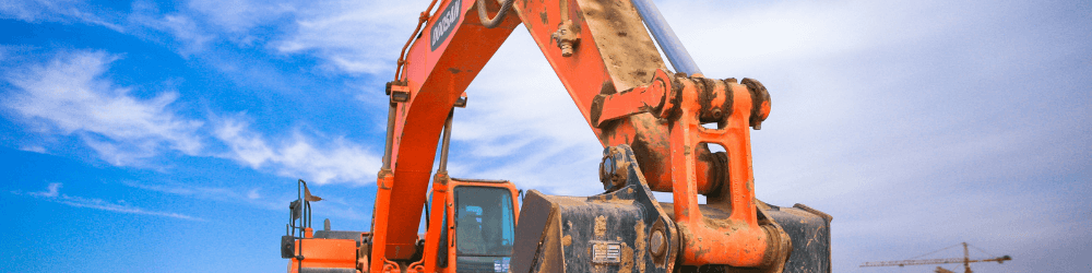 orange construction digger tractor heavy equipment