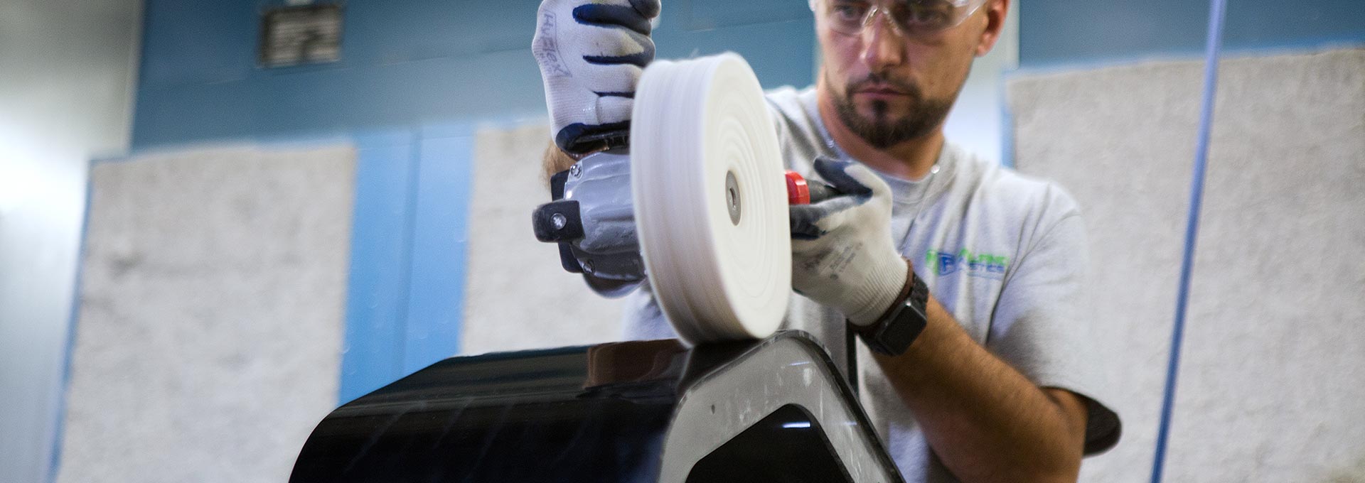 worker polishing a plastic product